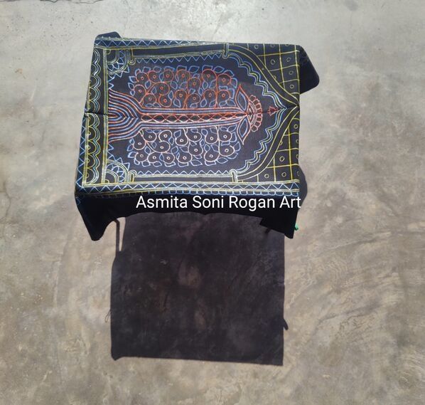 The fresh done Rogan piece under sunlight for drying