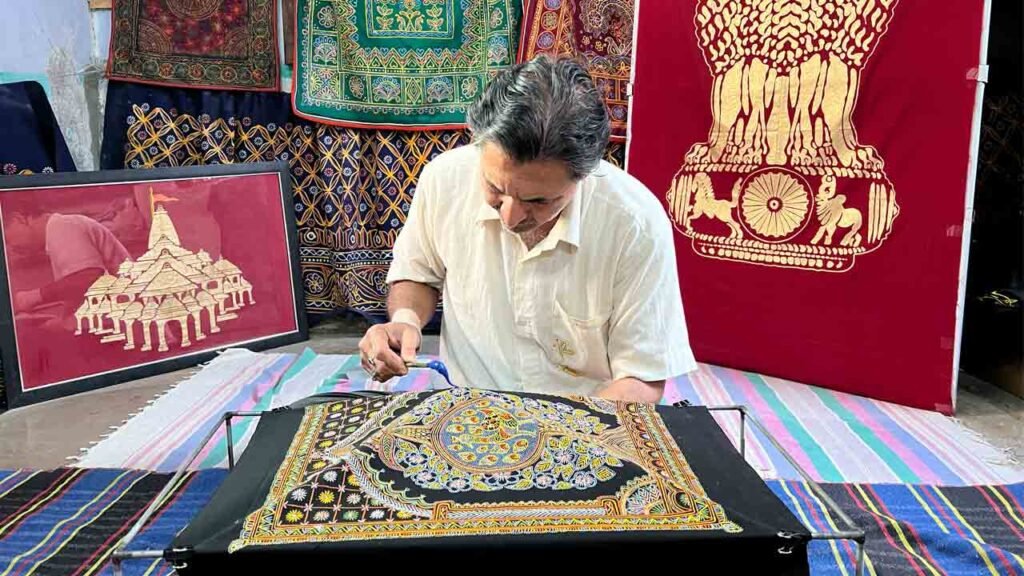 Detailed Tree of Life pattern created with traditional Kutch Rogan drying-oil paint on handloom fabric